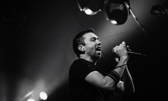 photoset-Tim-McIlrath-hard-core-RiseAgainst-concert-Make-It-Stop-2011